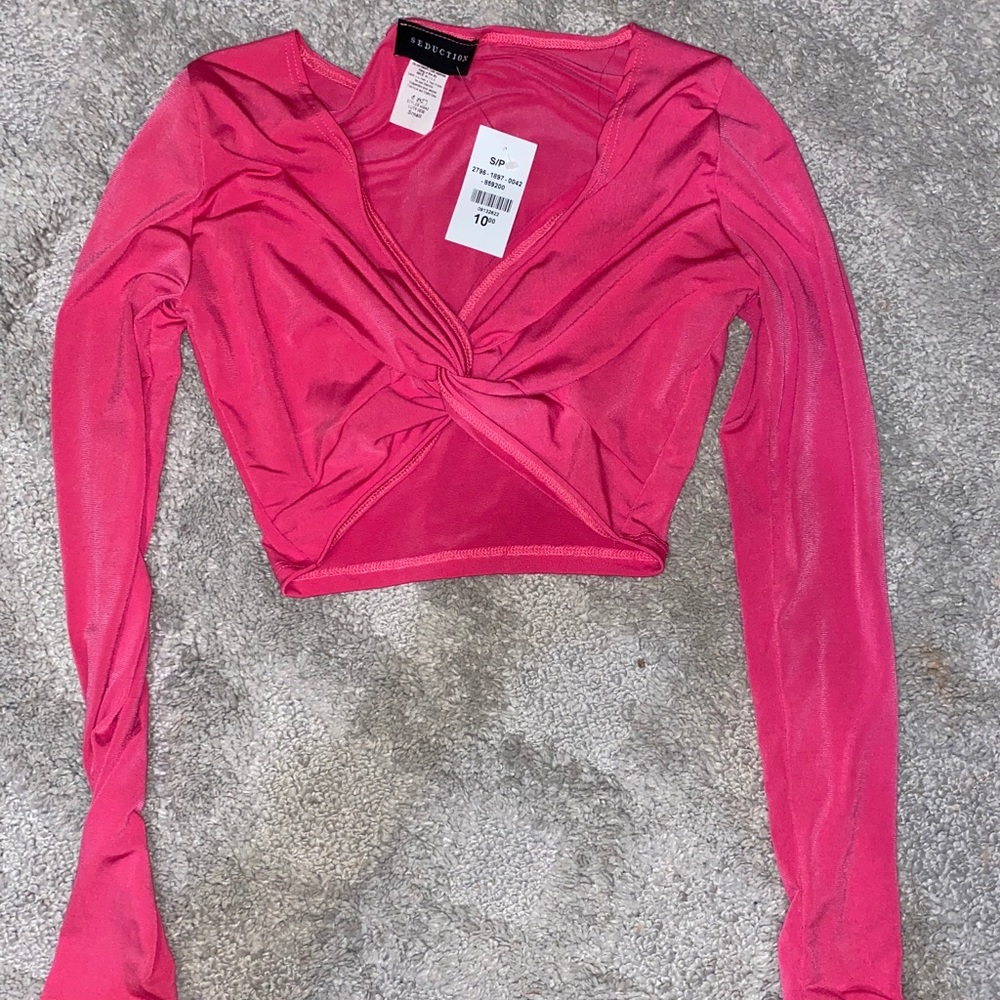 Pink long sleeve crop top v cut twist front